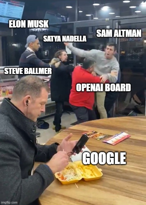 Meme featuring a photo of a man at a fast-food restaurant, engrossed in his phone, with a plate of food in front of him, labeled 'GOOGLE.' In the background, four people labeled 'ELON MUSK,' 'SATYA NADELLA,' 'SAM ALTMAN,' and 'STEVE BALLMER' are edited into an image of a physical altercation, representing 'OPENAI BOARD.' The meme humorously depicts Google as uninvolved and indifferent to a chaotic situation involving the leadership of OpenAI.